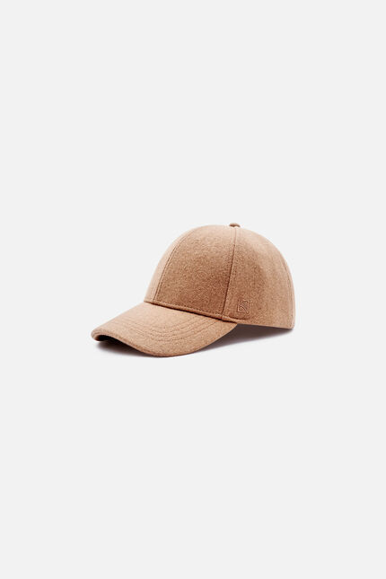 Boston cap camel woman