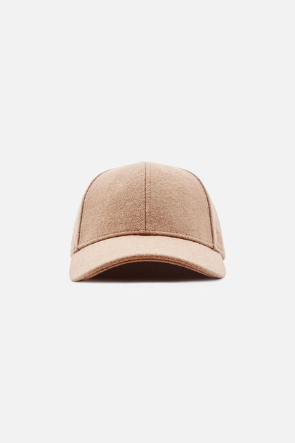 Boston cap camel woman