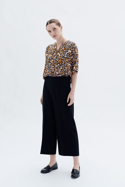 Pantalon pierce noir femme