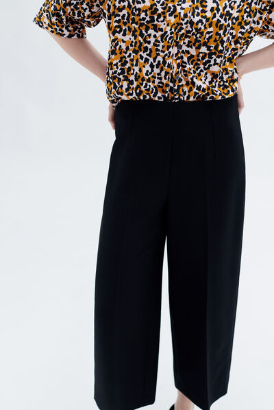 Pantalon pierce noir femme