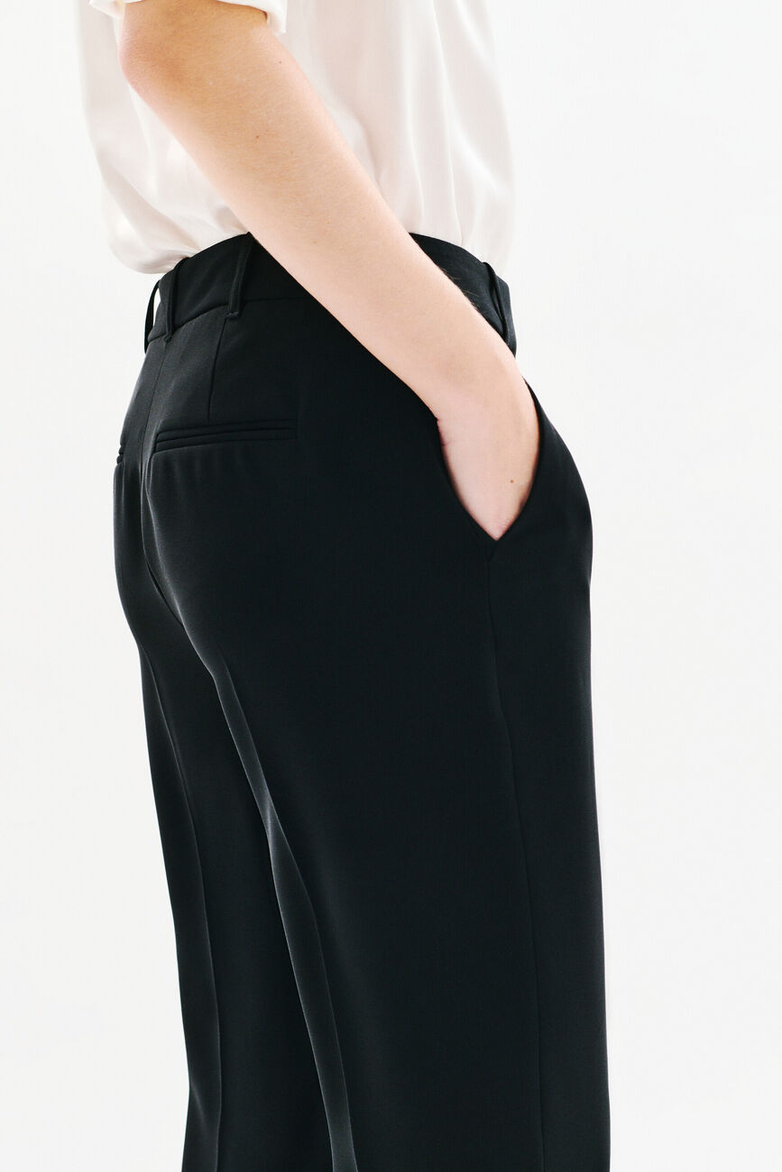 Pantalon pgautier noir femme