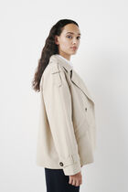 gourmand trench coat sand woman