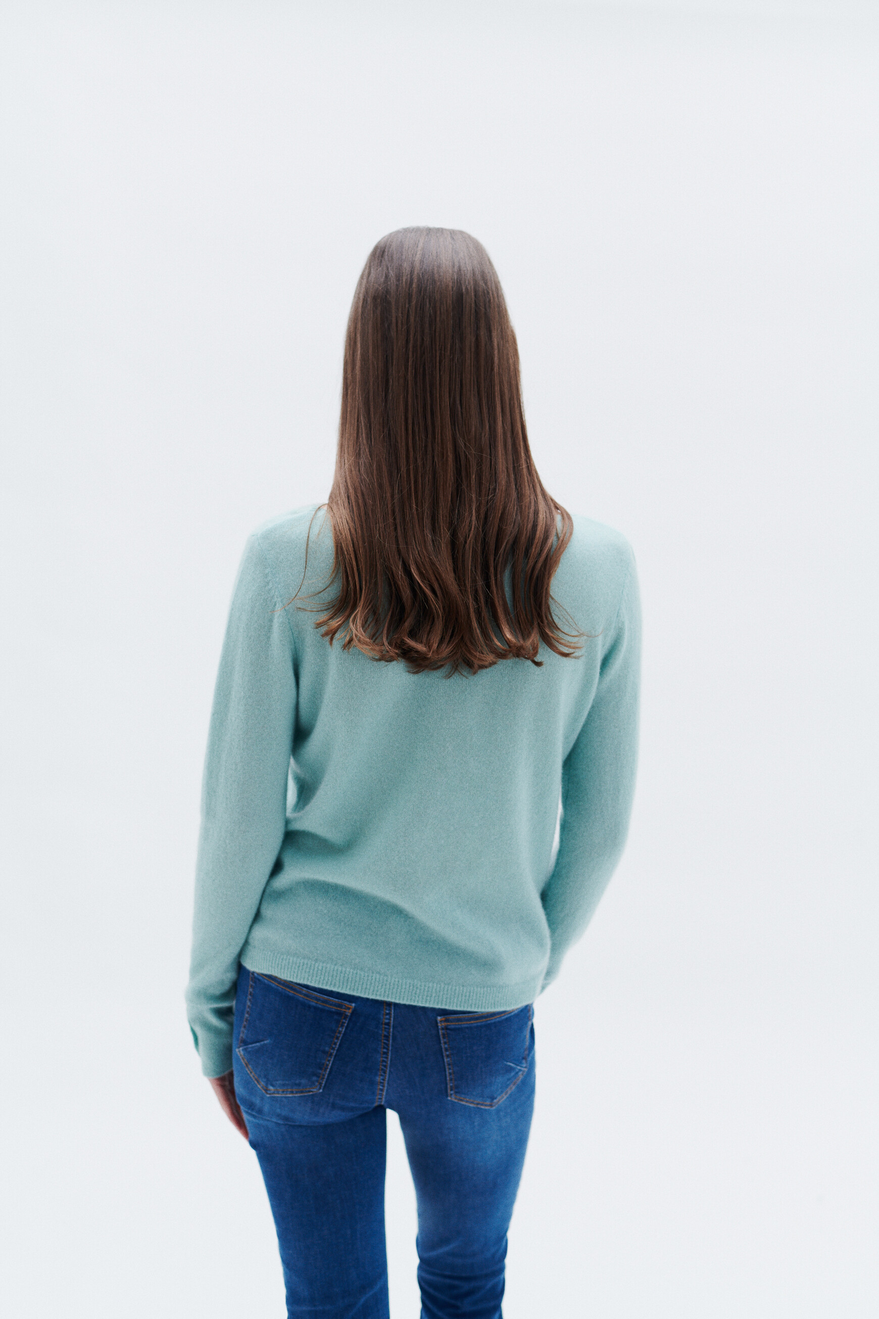 Pull store bleu vert
